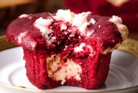 Red Velvet Muffins Filled with Cream Cheese Swirl
