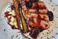 Sous-Vide Duck Breast with Rainbow Carrots, Cauliflower & Cherry Gastrique