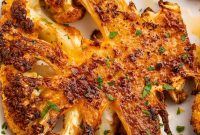 Crispy Roasted Cauliflower Steaks with Garlic Herb Sauce