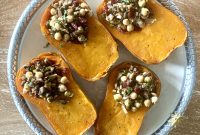 Honeynut Squash Stuffed with Mushrooms, Chickpeas, Pistachios & Cranberries