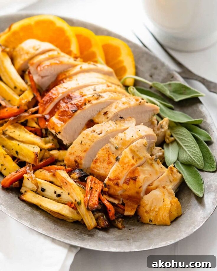 A platter of marinated roast turkey breast with carrots and parsnips.
