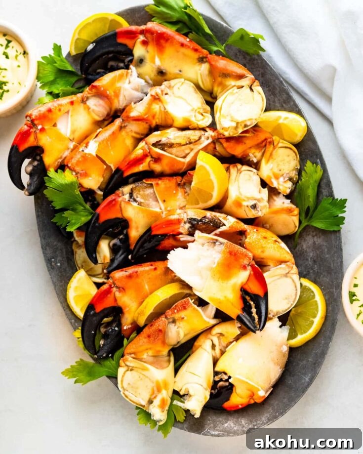 Stone crabs on a platter with mustard dipping sauce.