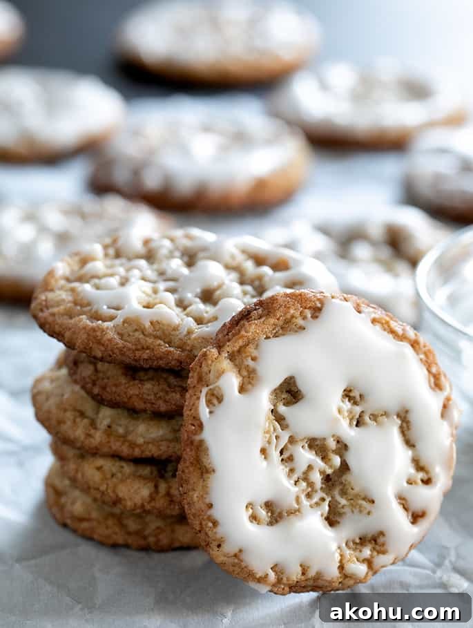 Thin Chewy Gluten-Free Iced Oatmeal Cookies 6 Short stack of gluten free iced oatmeal cookies, with one cookie facing forward.