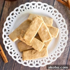 cinnamon shortbread cookies recipe piled on small decorative plate close up