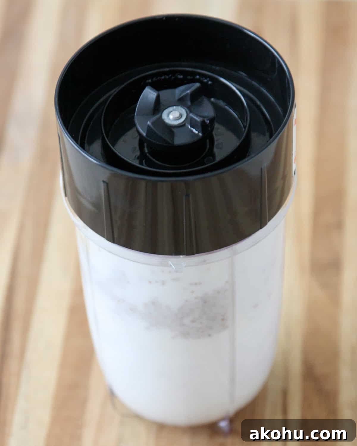 The recipe ingredients in a blender.