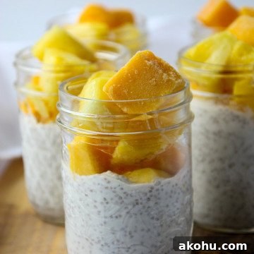 A close up of chia pudding in a jar, with fruit