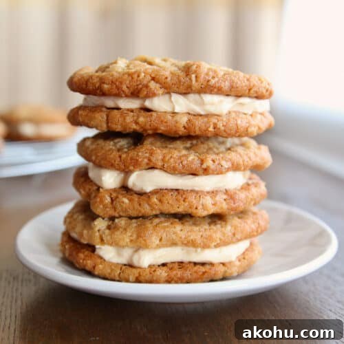 A stack of 3 oatmeal cream pies on a dessert plate.