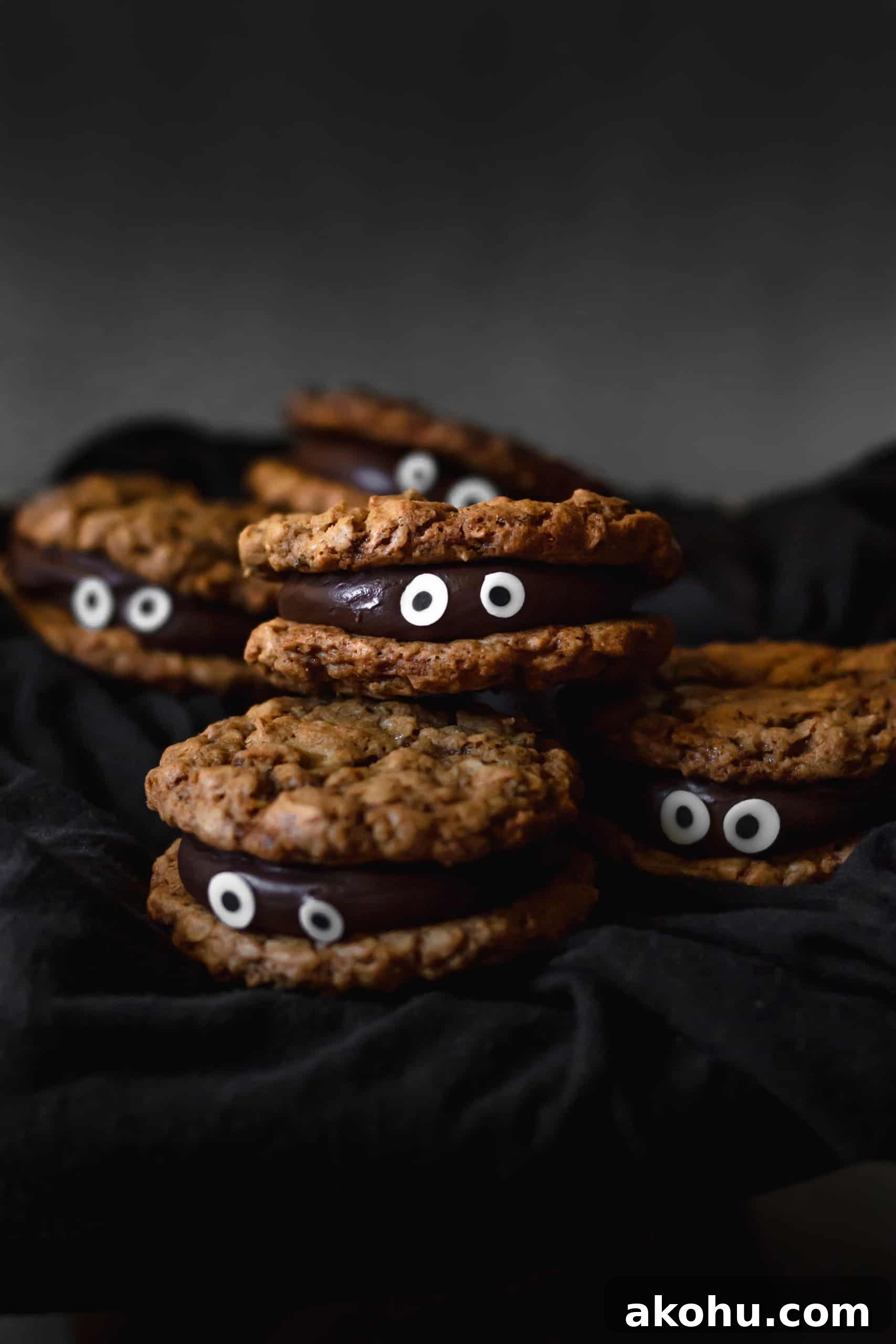 Chocolate fudge sandwiched between two oatmeal cookies make for a delicious and spooky treat!