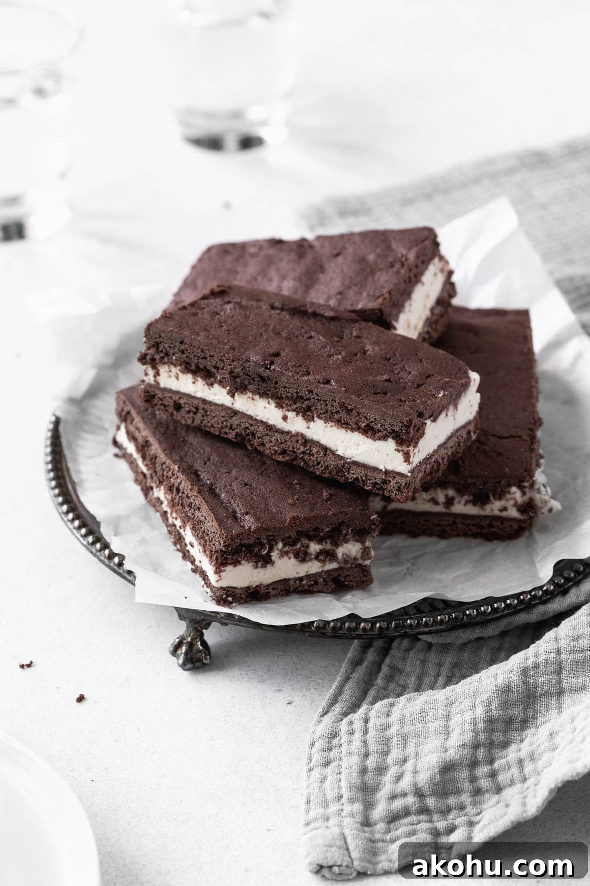 Gluten-Free Ice Cream Sandwiches You’ll Love 3 A stack of gluten-free ice-cream sandwich cookies on an antique serving platter.