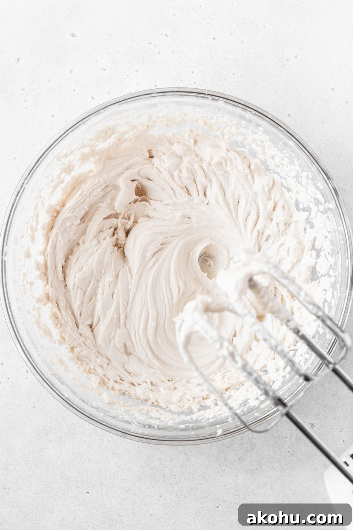 Gluten-Free Ice Cream Sandwiches You’ll Love 10 Whipping up oat milk whipping cream in a glass mixing bowl.