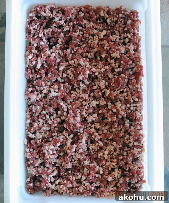 white rectangle container full of ground corned beef