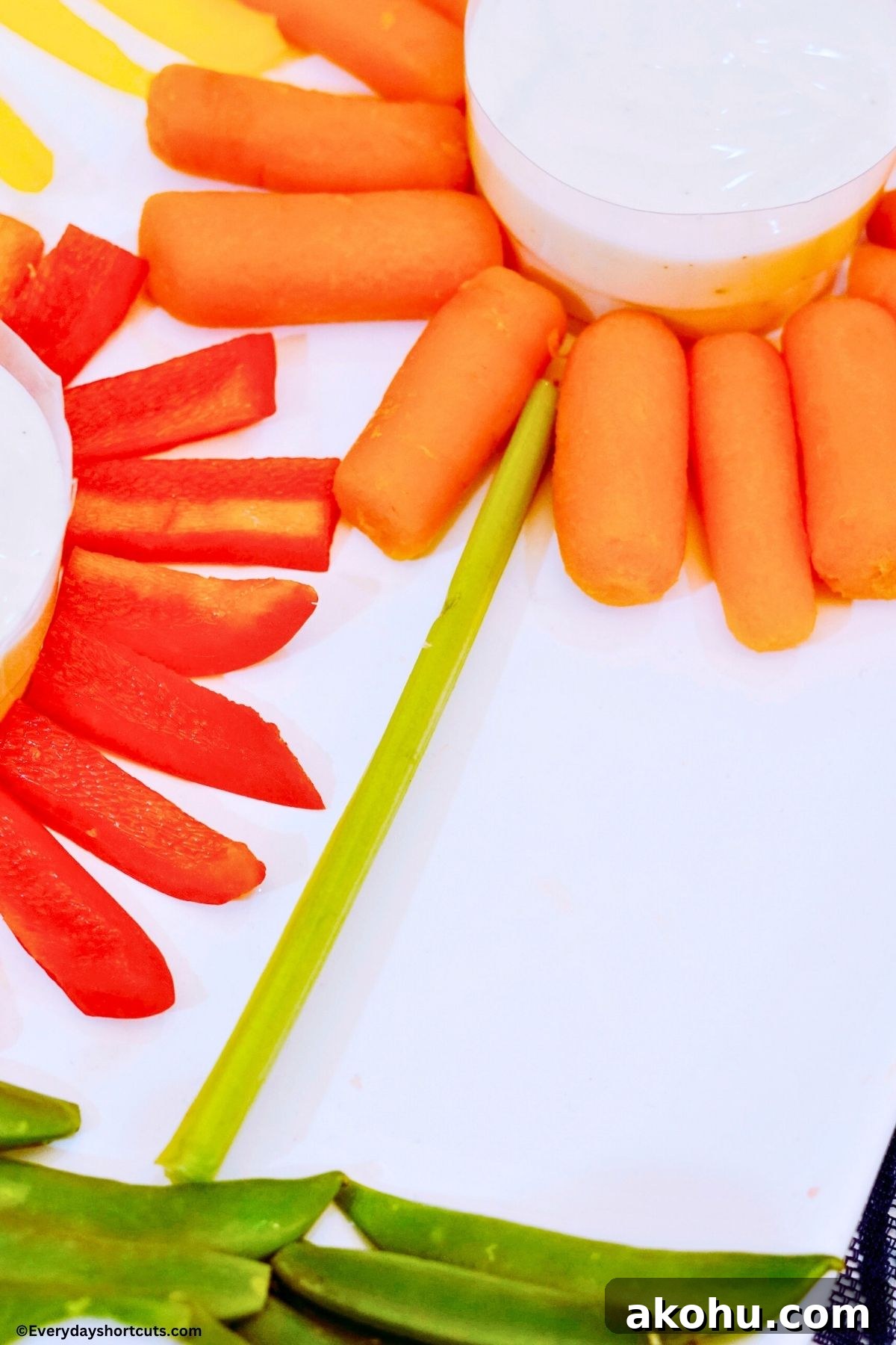 Blooming Vegetable Platter: Stunning Veggie Flower Tray Tutorial 7 small thin celery strip for veggie flower stem