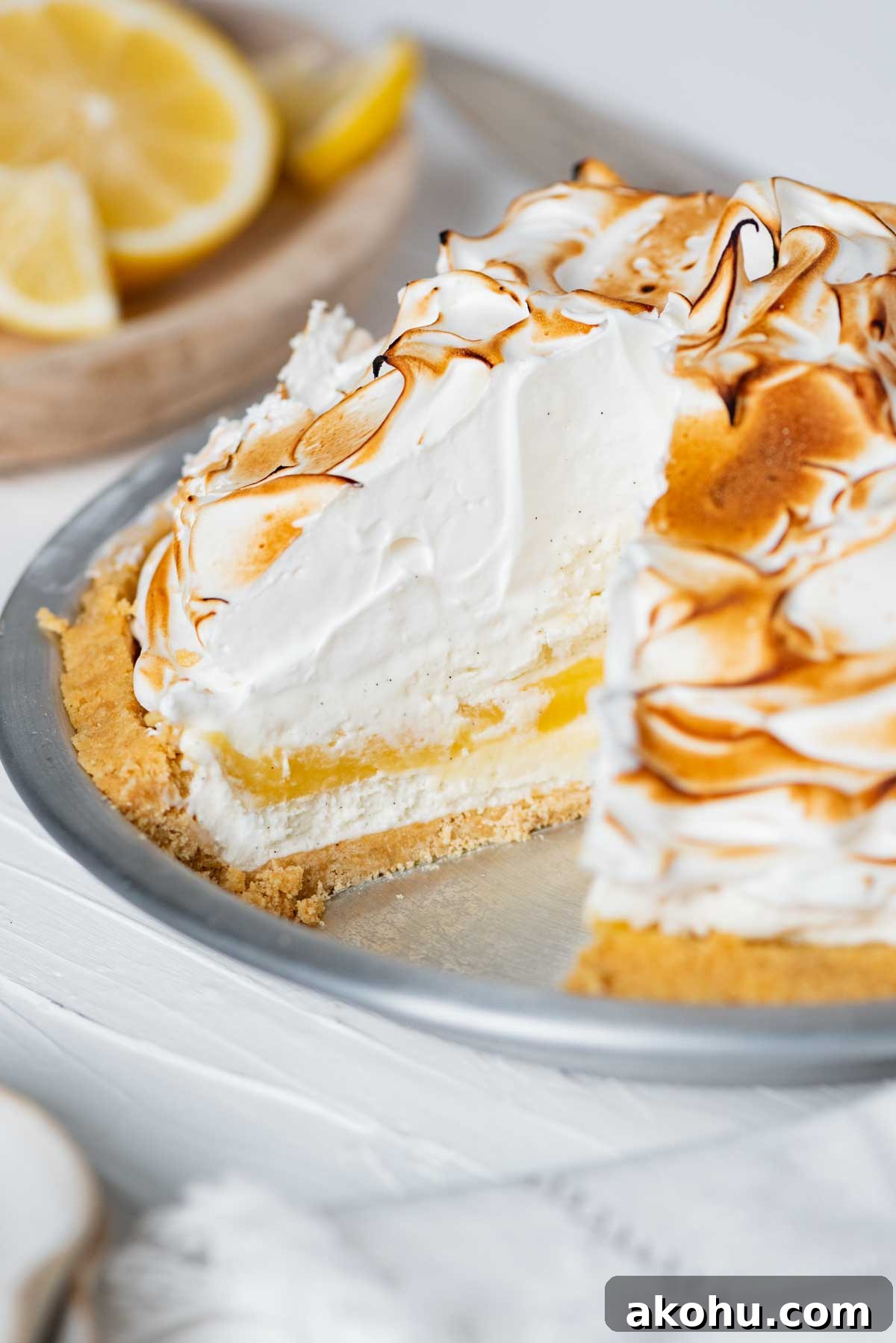 Lemon Meringue Ice Cream Pie with slice removed | © Beyond the Butter®