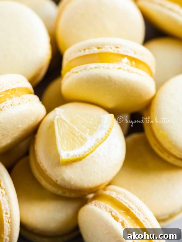 Close up of lemon bar macarons randomly placed.