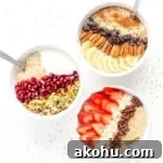 Three bowls of steel cut oats with different toppings on each bowl.