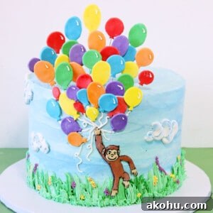 Close up of a Curious George Birthday Cake.