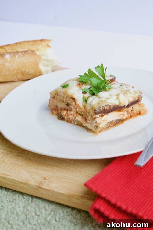 Low-Carb Eggplant Parmesan Lasagna Recipe for Keto Meals 3 Low-Carb Eggplant Lasagna Recipe Sliced on Plate