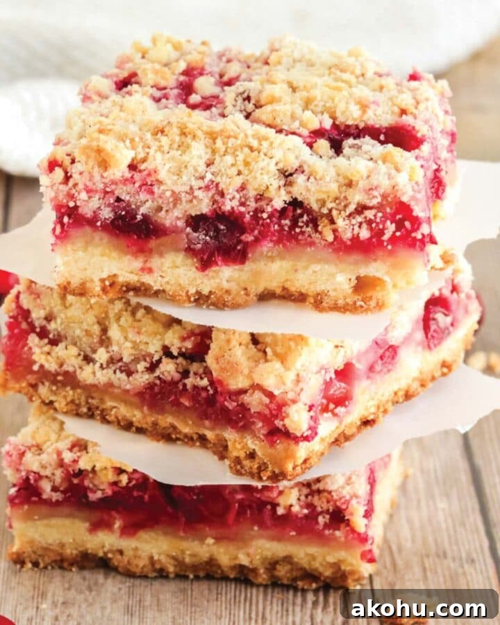 Stack of fresh cranberry bars ready to eat.