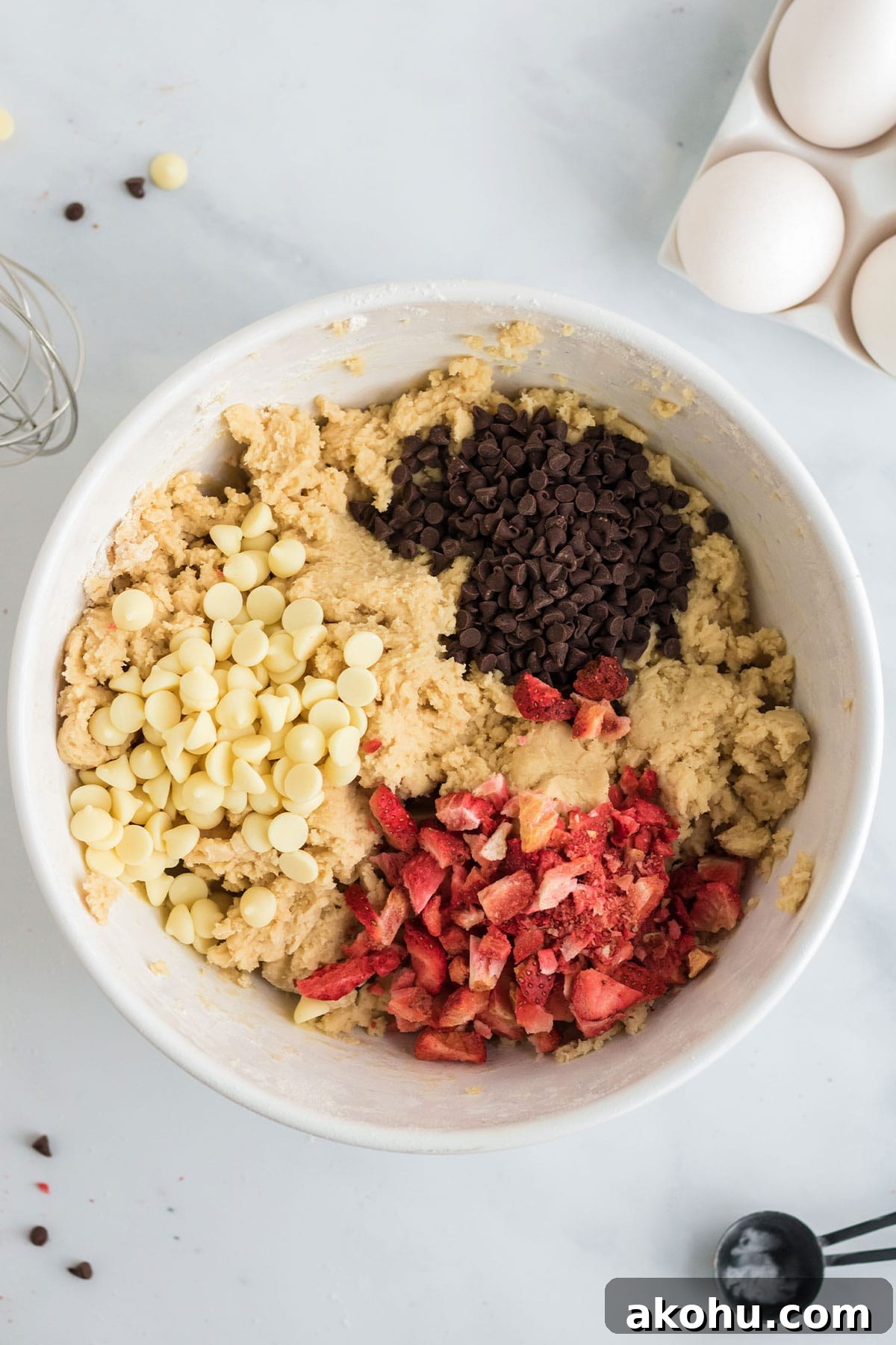 Adding the chocolate chips and strawberries.