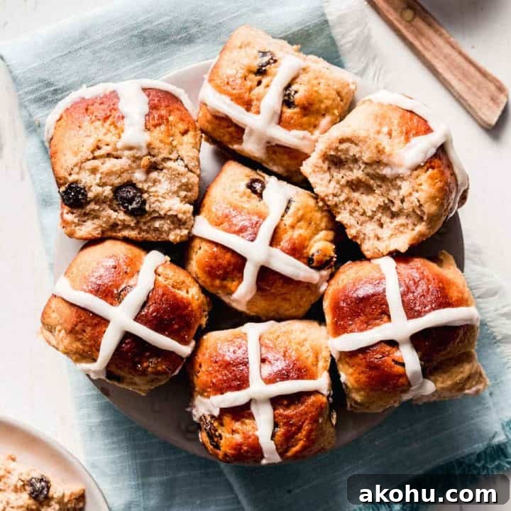 A plate full of gluten-free hot cross buns.