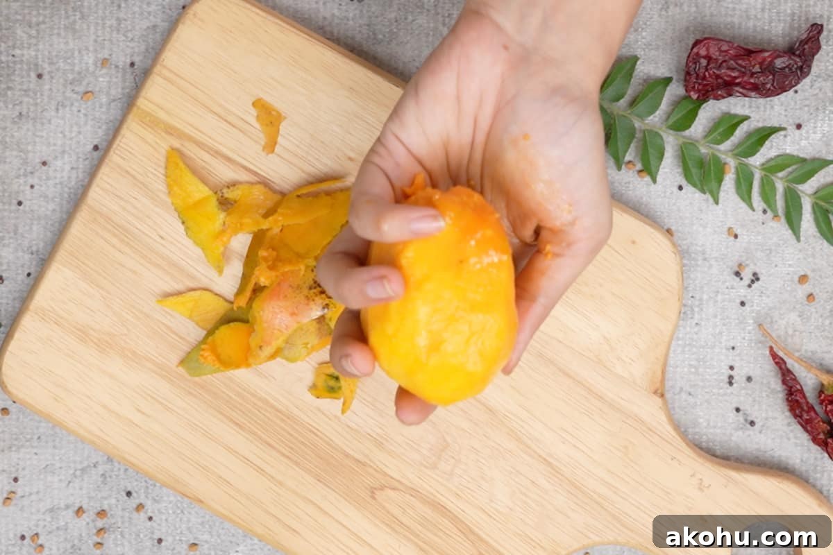 Peeled ripe small mango.