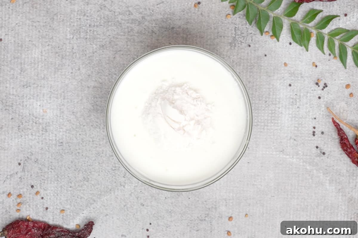 All purpose flour and yogurt in a bowl.
