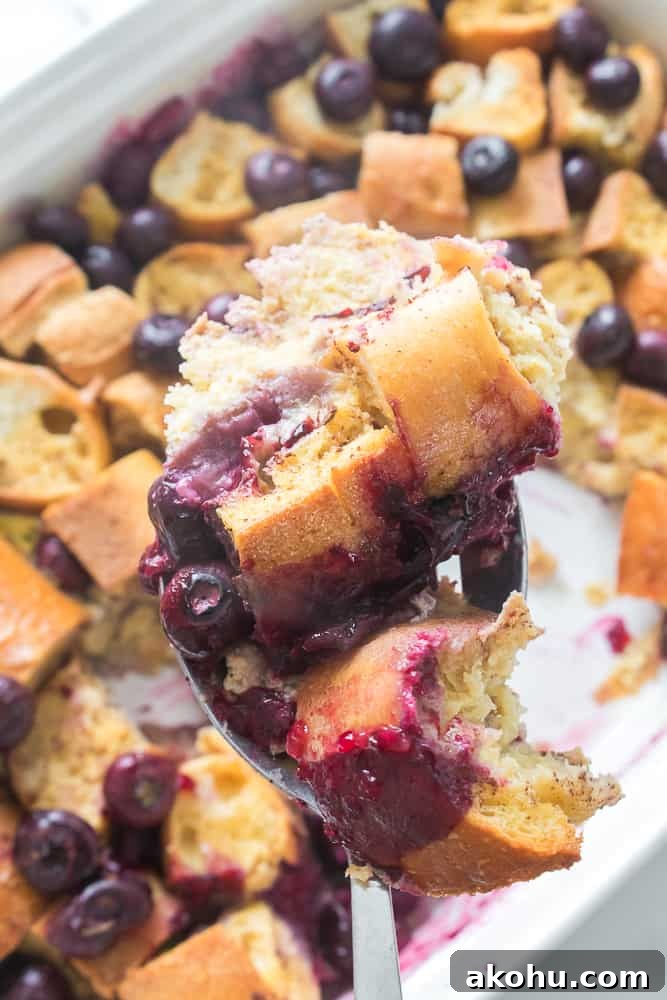close up of blueberry French toast casserole on a fork