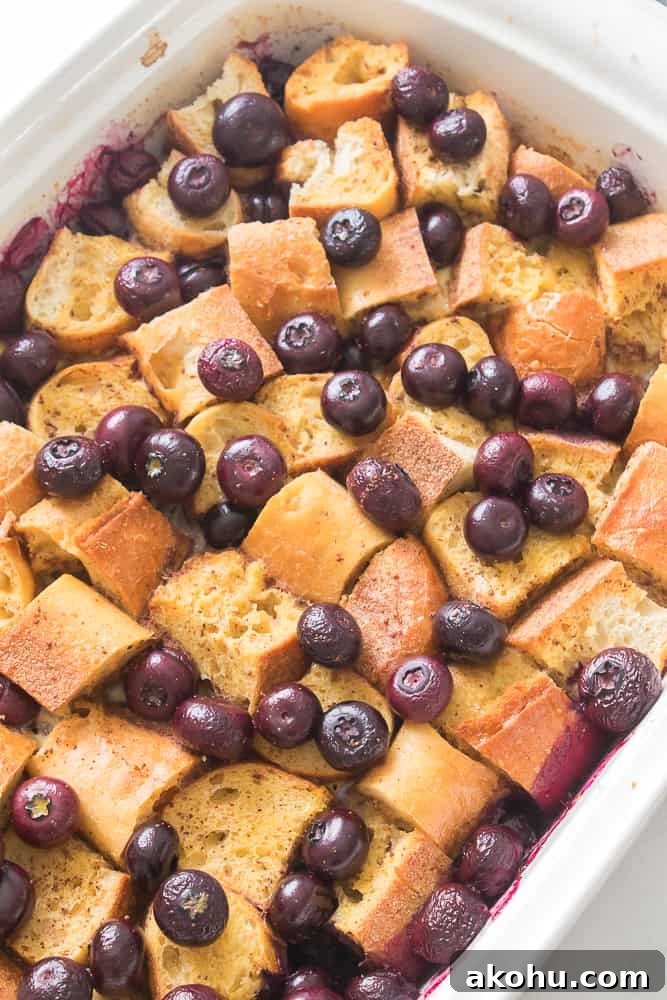 blueberries on top of the French bred in casserole dish