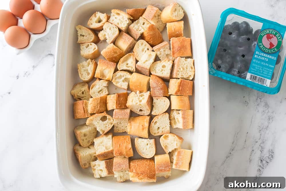 eggs, bread in casserole dish and North Bay Produce blueberries in packaging