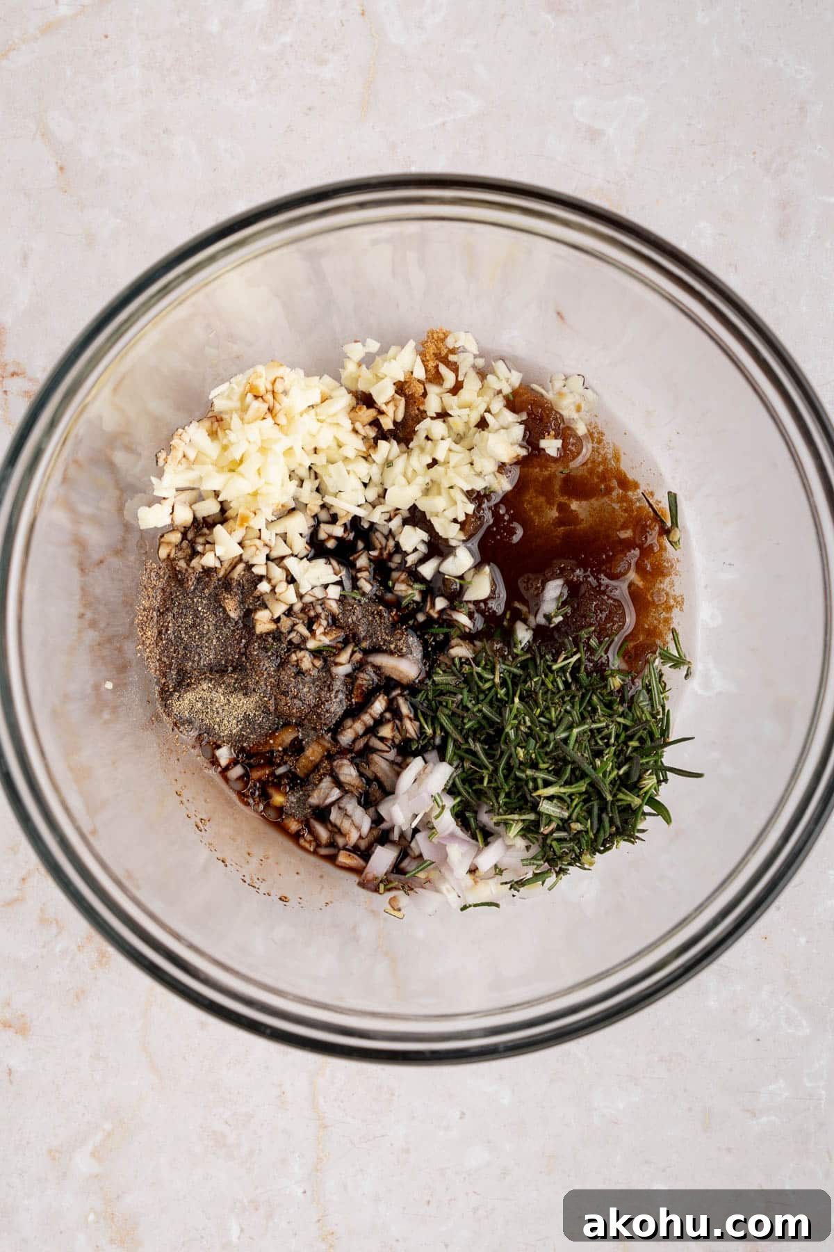 Balsamic-Glazed Oven Roasted Lamb Chops for Dinner 3 All of the marinade ingredients in a glass bowl on a countertop.
