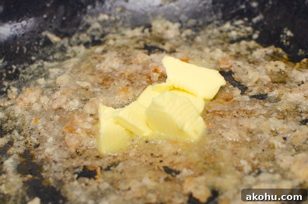 rice wine vinegar and butter in the pan to help scrape of the cooked cornstarch to make our sizzling spicy pork