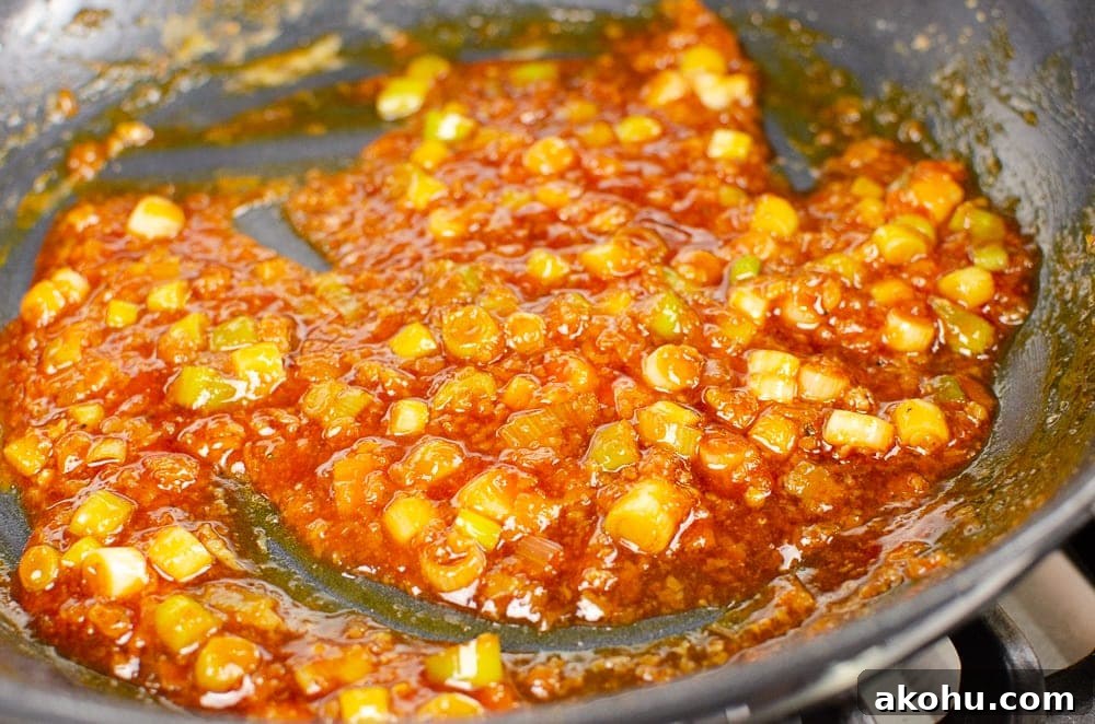 stir all the ingredients together , dissolving the sugar to make our sizzling spicy pork