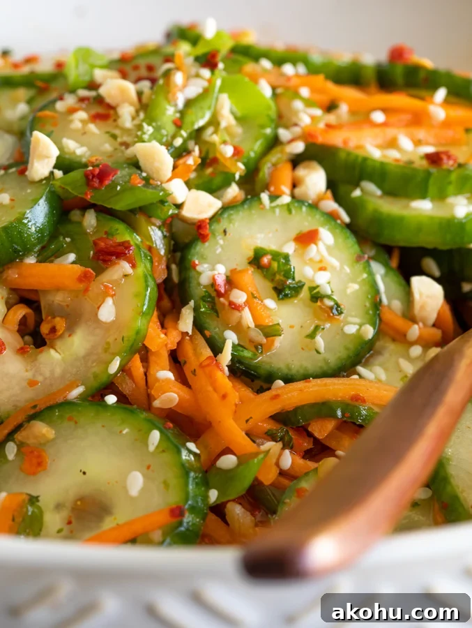 A picture of a bowl of carrot cucumber salad