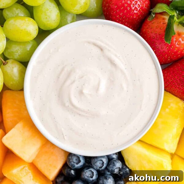 10-Minute Tiramisu Dip: Creamy Espresso Mascarpone Recipe 8 Cream cheese fruit dip surrounded by fresh fruit.