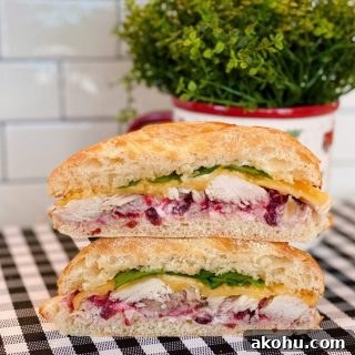 Hot Cranberry Turkey Sandwich cut in half.