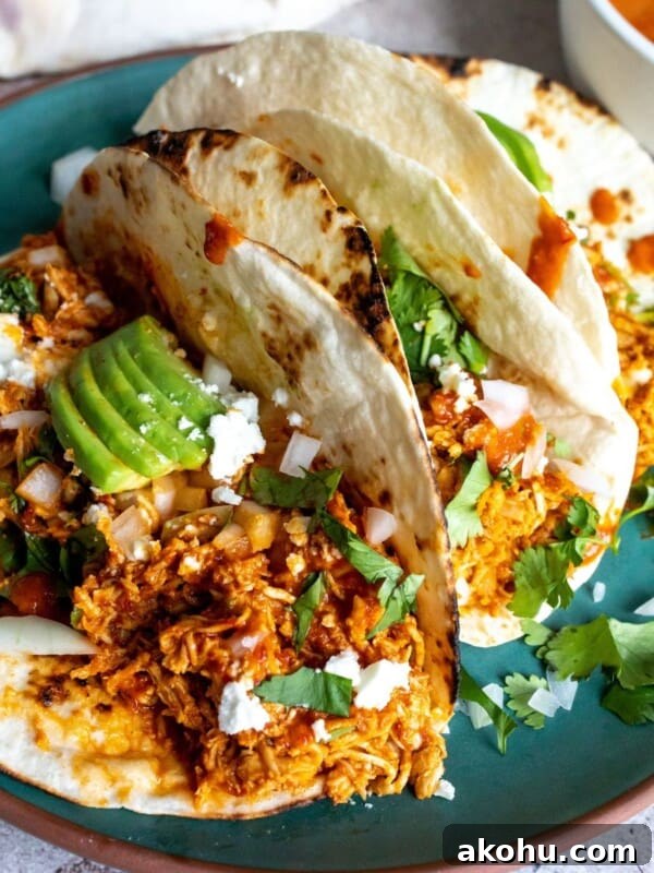 Chipotle Chicken Tacos on a green plate.