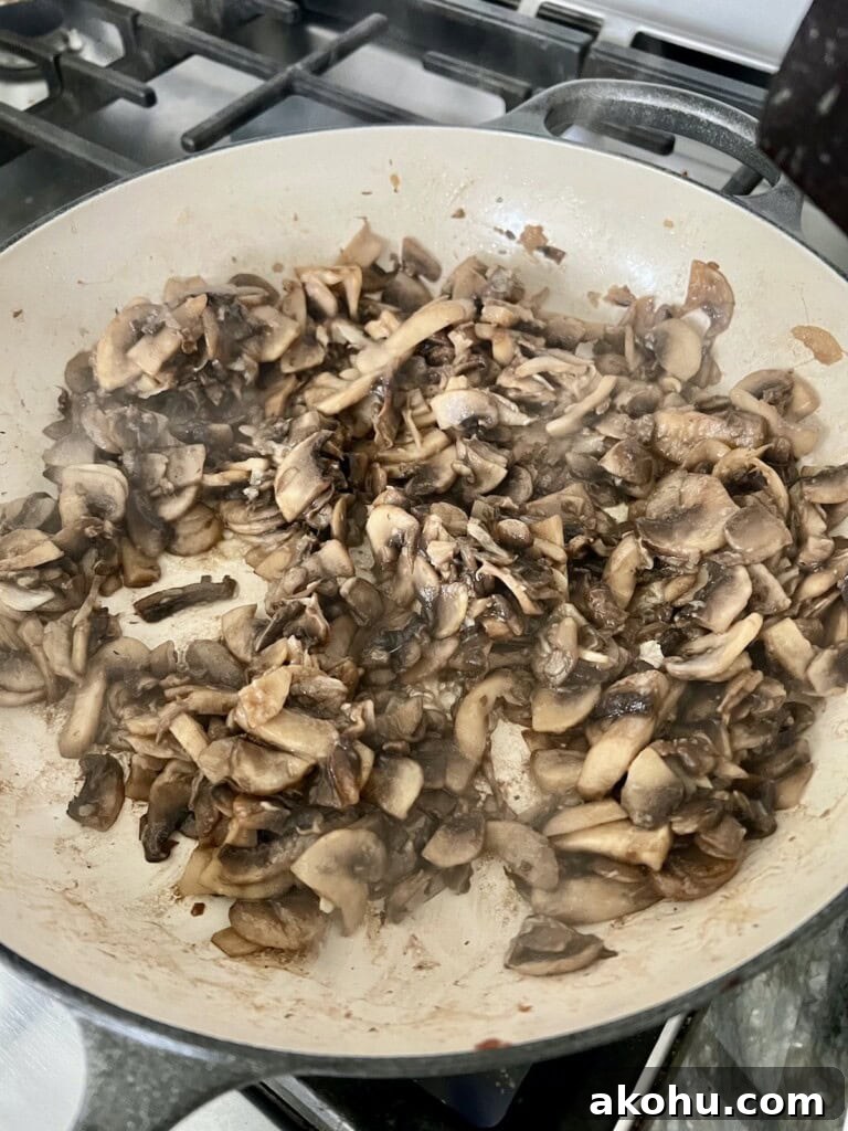 Cooking mushrooms for Italian chicken francese.