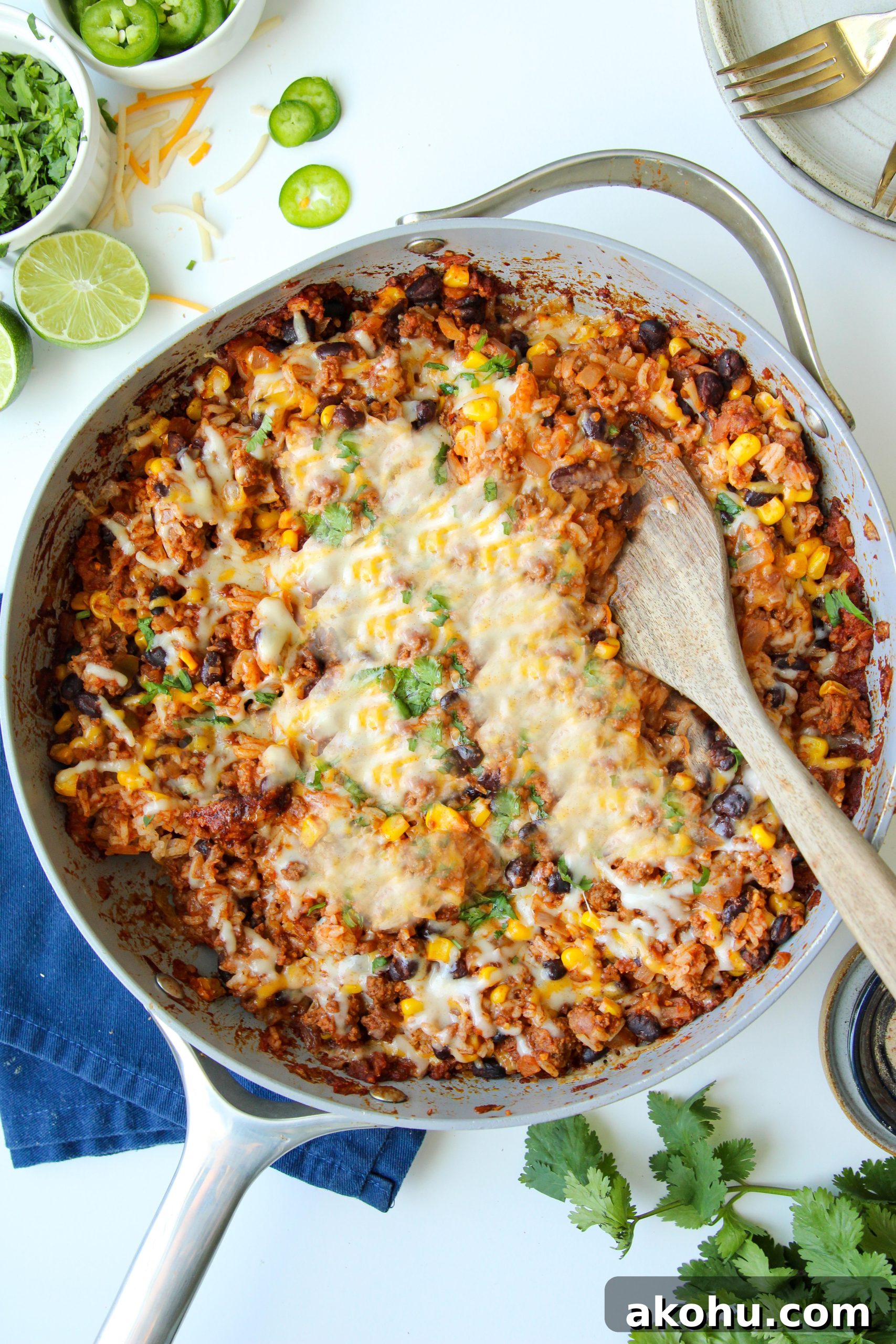 Easy Gluten-Free Dairy-Free Taco Rice Skillet made with ground beef, rice, black beans, corn, salsa, and dairy-free cheese. This simple one-pan dinner is family-friendly, budget-friendly, and perfect for busy weeknights. A hearty gluten-free dairy-free meal that reheats well for leftovers too.