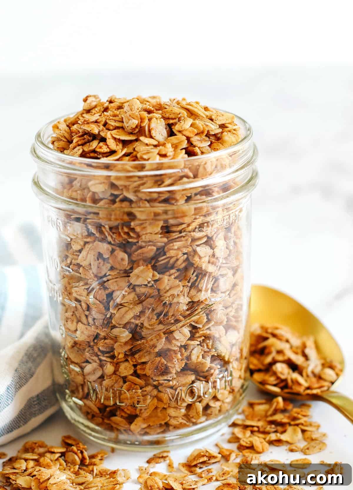 Maple Cinnamon Granola Recipe with Crunchy Oats & Nuts 3 Baked granola on sheet pan