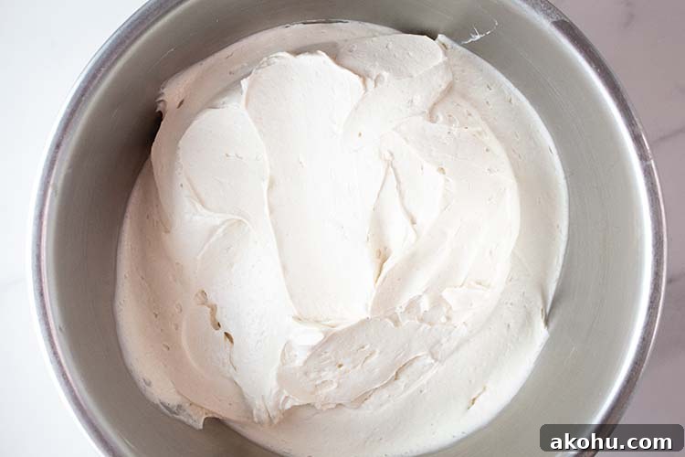 overhead view of cream cheese filling mixture after it has been combined with whipped cream