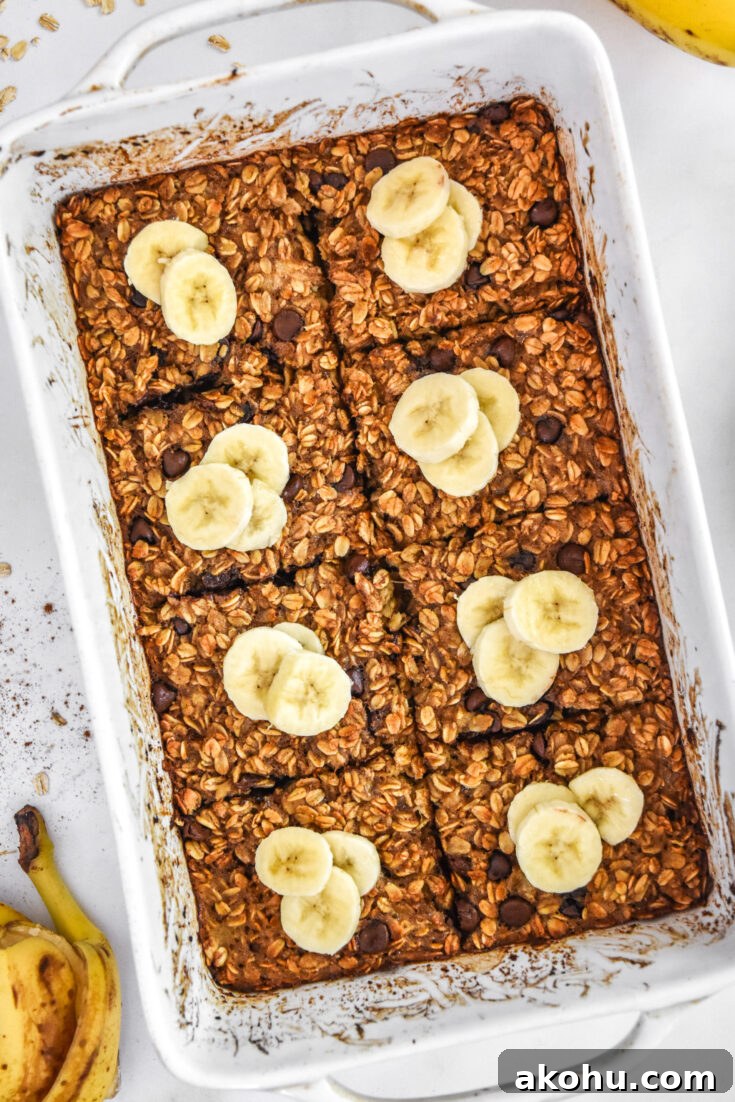 chocolate chip banana bread baked oatmeal fresh baked in a white casserole dish.