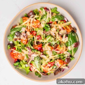 Classic Italian Chopped Salad Recipe with Zesty Dressing 8 An overhead image of an Italian chopped salad in a serving plate.