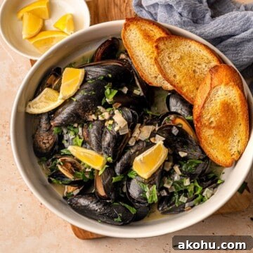 Garlic butter mussels in a bowl.