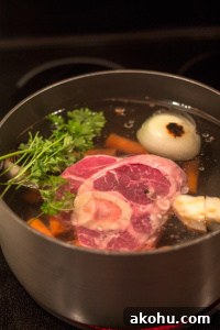 A pot with meat and veggies for soup