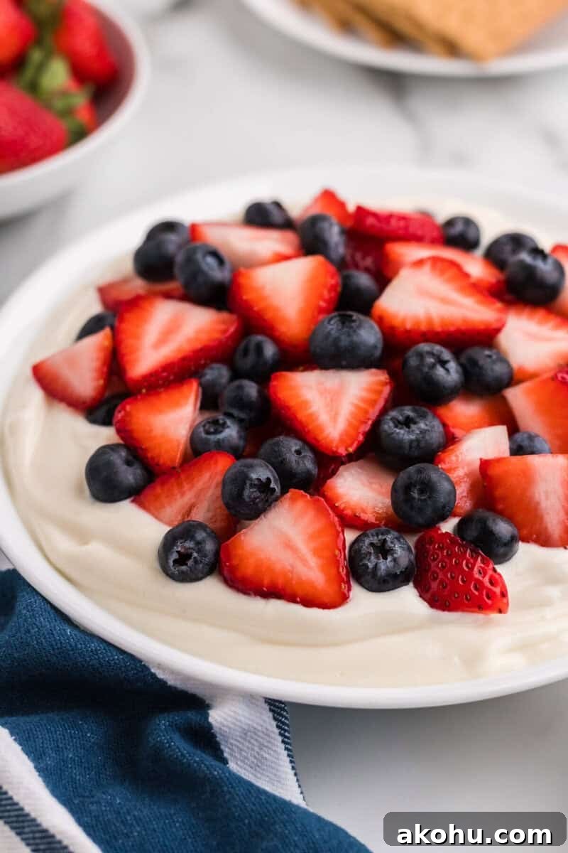 Patriotic Layered Cheesecake Dip for Fourth of July Parties 8 closeup of the Patriotic Cheesecake Dip.