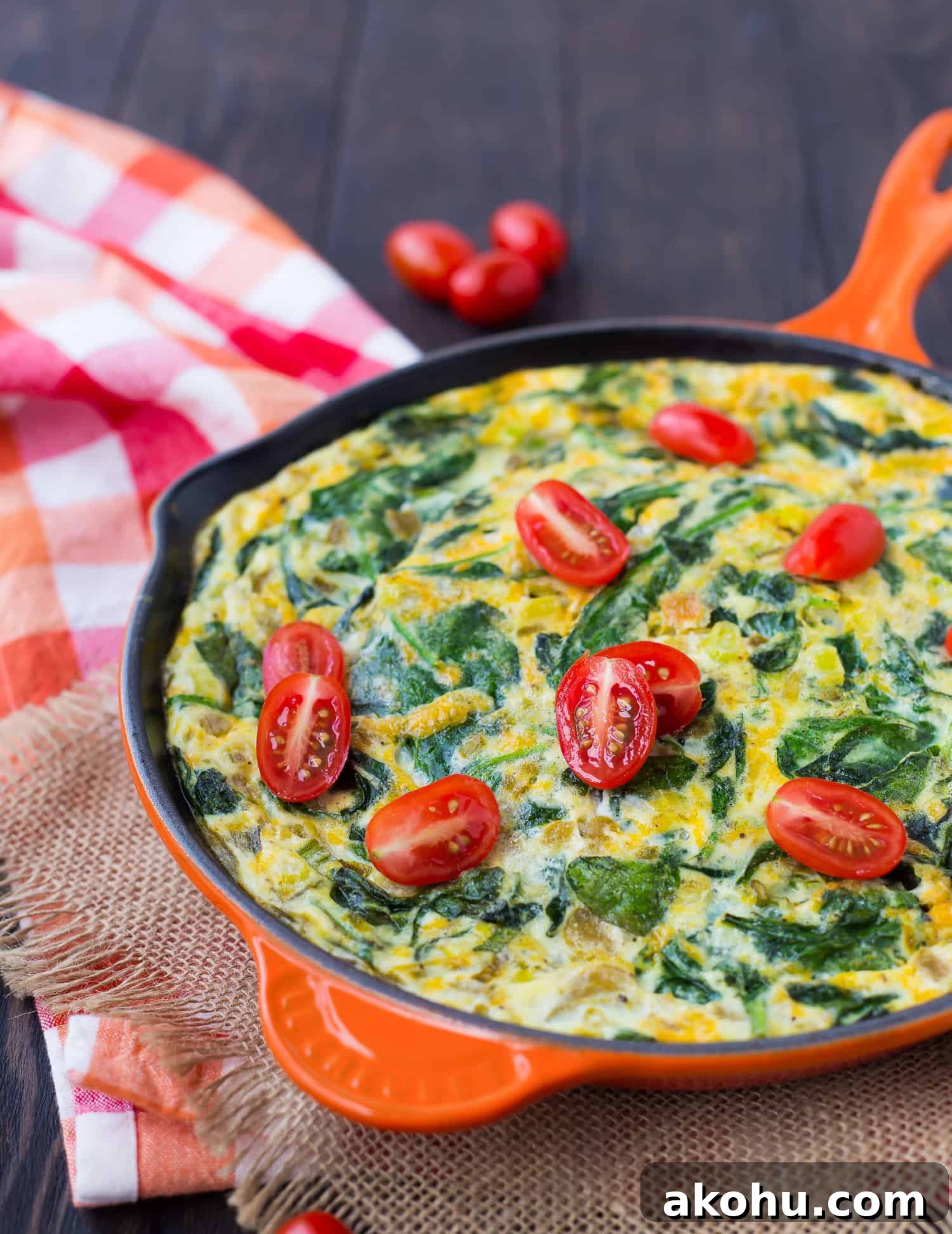Egg white frittata topped with tomatoes.