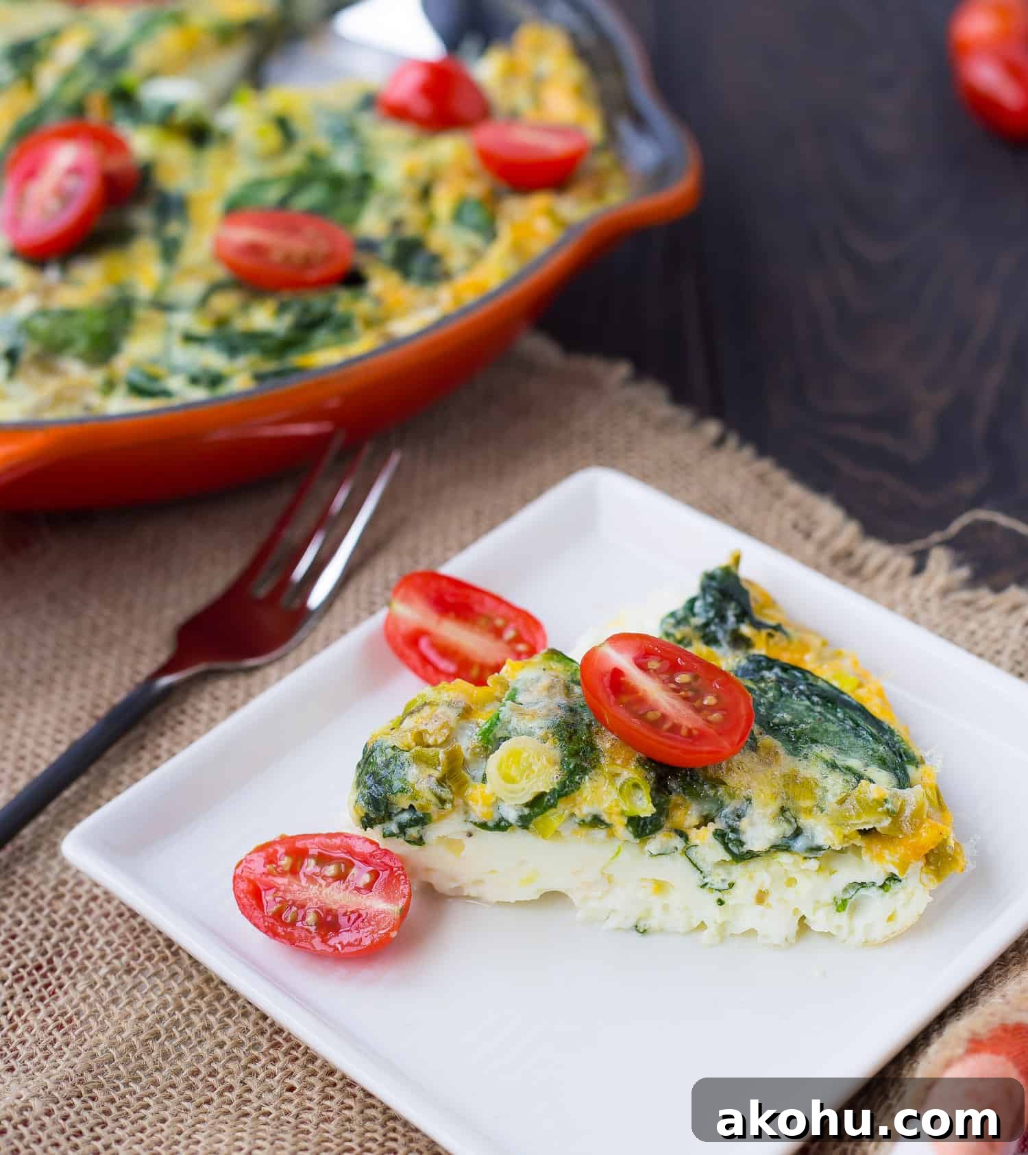 Slice of egg white frittata on white plate.