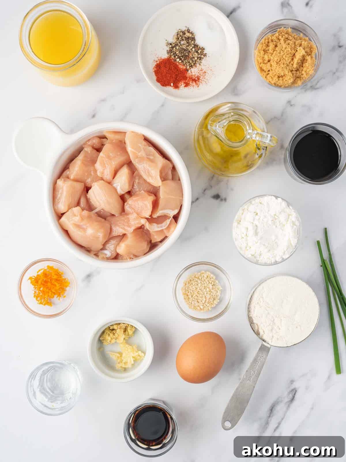 Ingredients needed for crispy air fryer orange chicken.