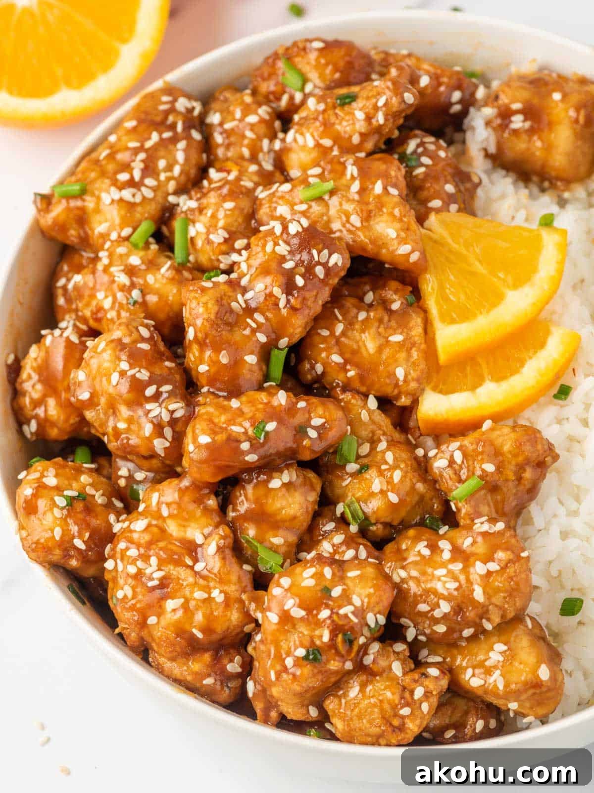 Crispy air fryer orange chicken with rice.