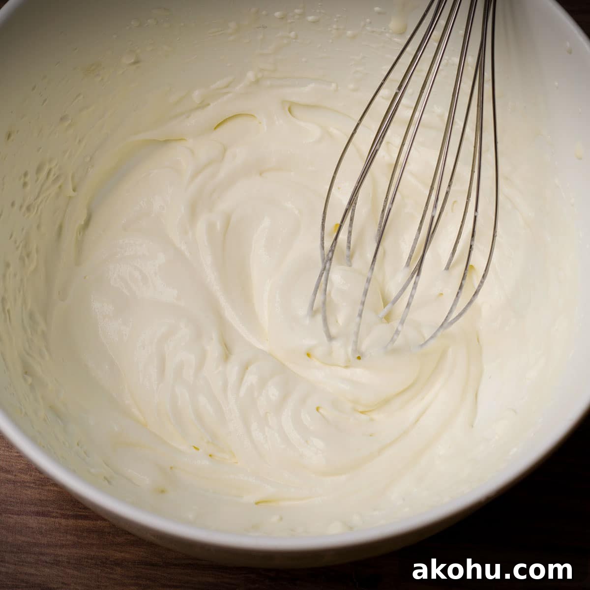 Red Velvet Muffins Filled with Cream Cheese Swirl 13 Use an electric mixer to beat heavy cream until thick enough to hold its shape.
